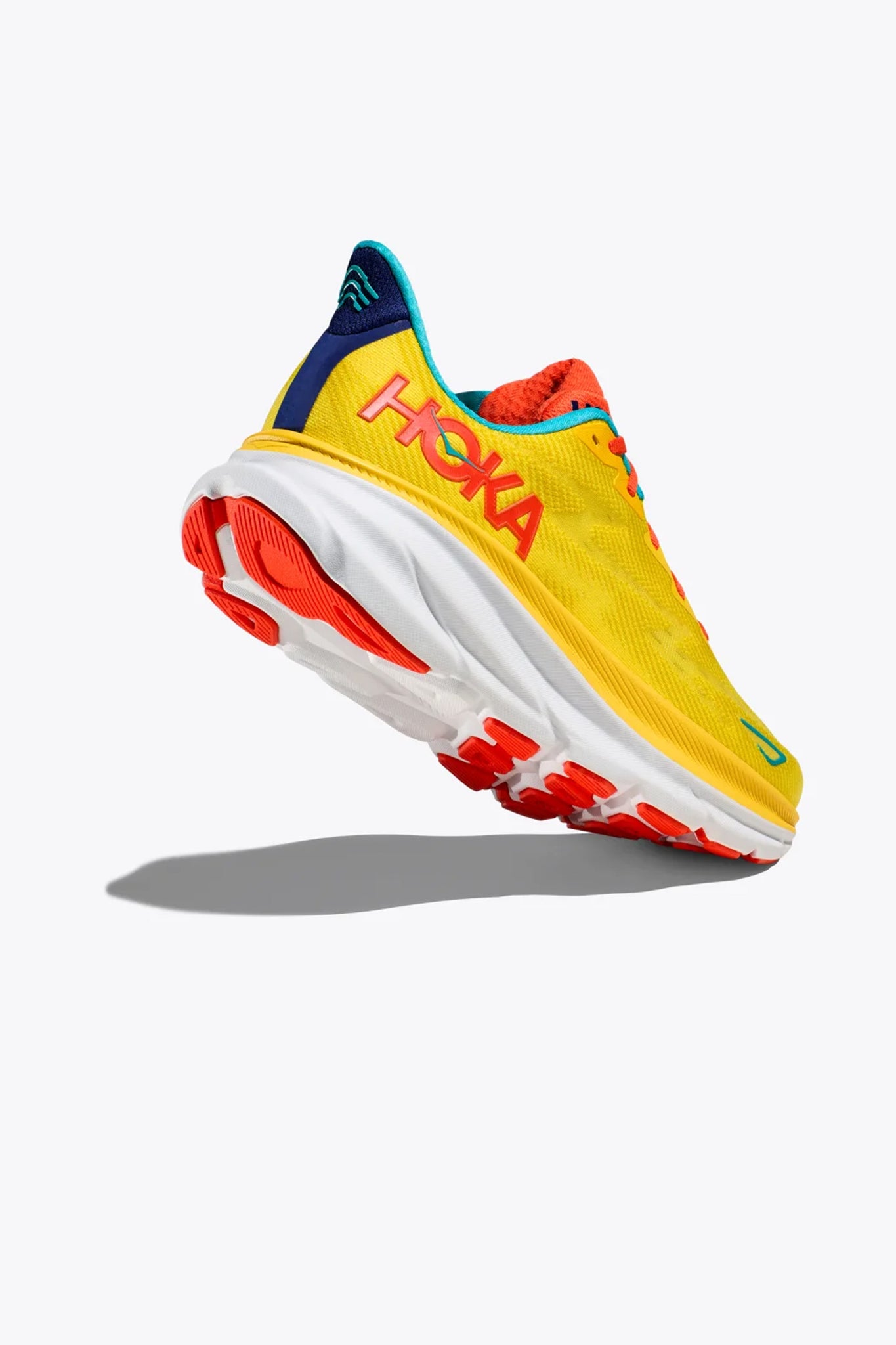 HOKA Men's Clifton 9 Sneaker in Passion Fruit/Maize