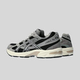 ASICS Men's Gel-1130 Sneaker in Black/Carbon