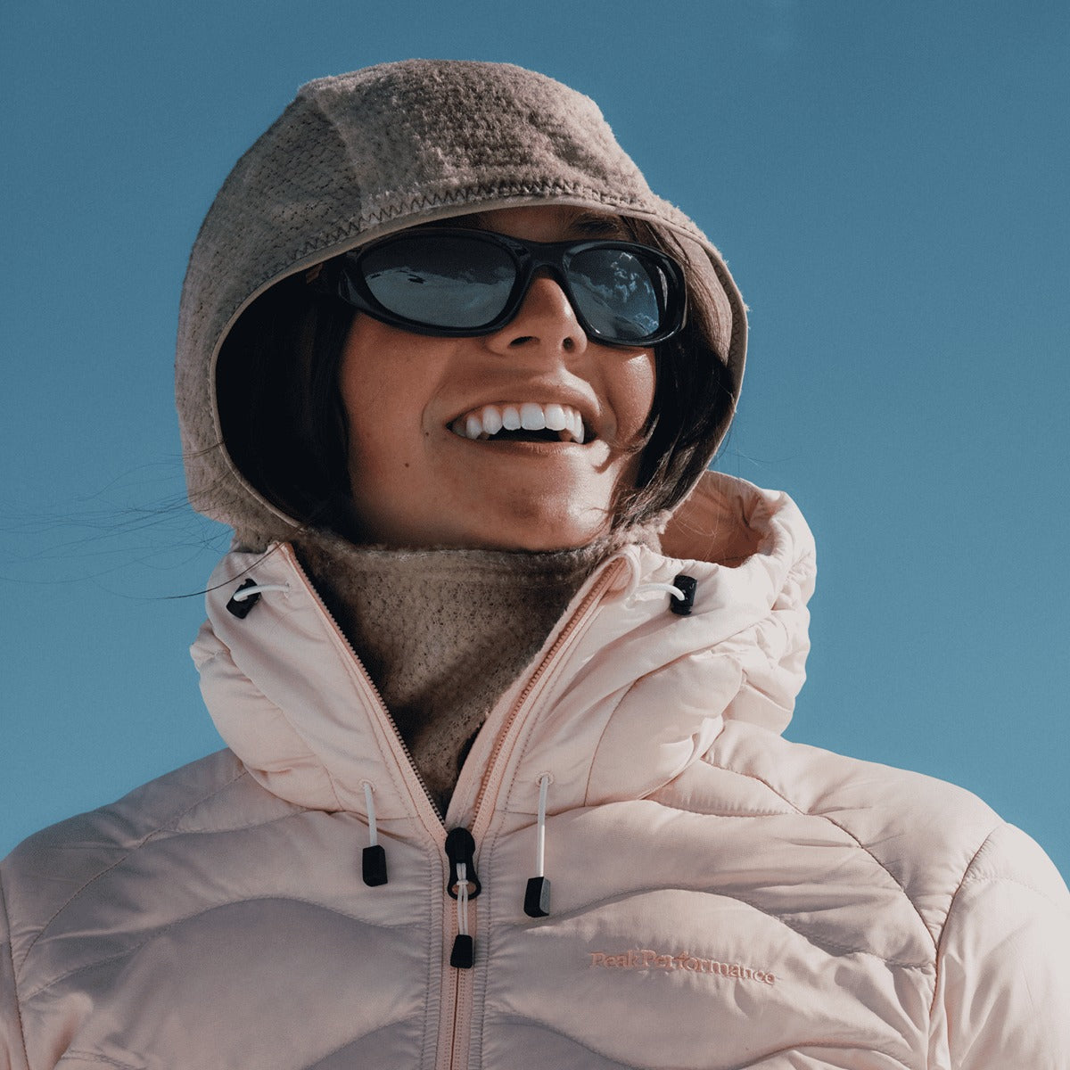 Peak Performance FW26 campaign - women's Helium down jacket